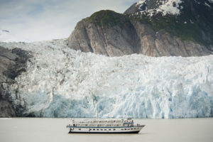 Admiratly Dream Cruise Sails infront of a Glacier
