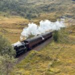 Steam Train Rolling through the English Countryside