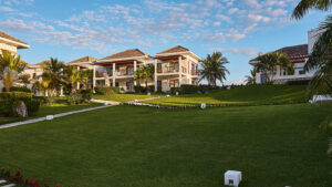 Las Veranda Hotel Exterior with lawn and sky